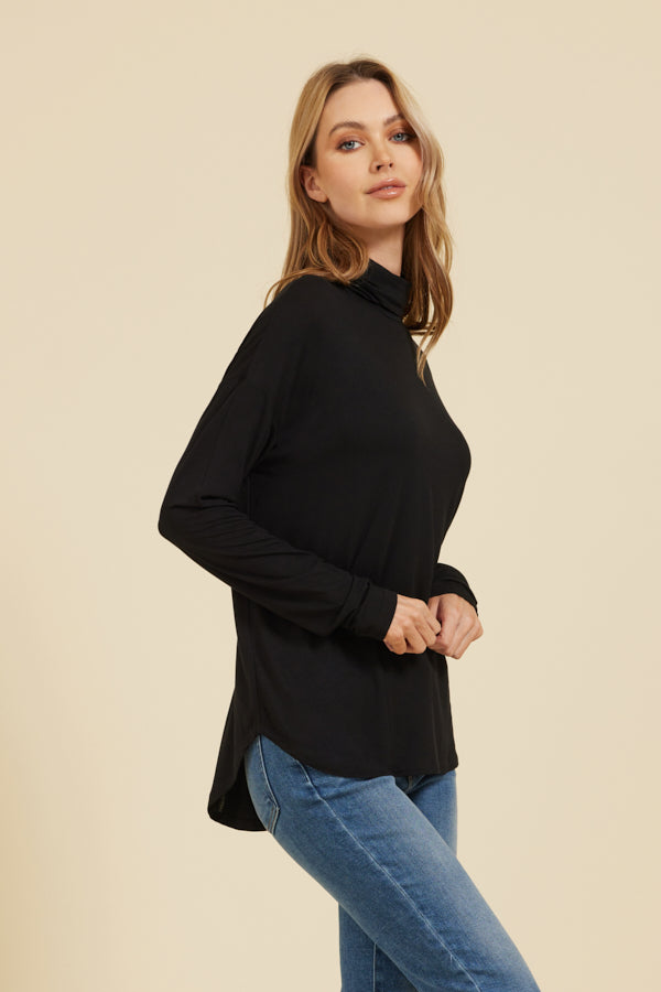 Majestic Soft Touch Semi-Relaxed Long Sleeve Drop Shoulder Turtleneck in Black
